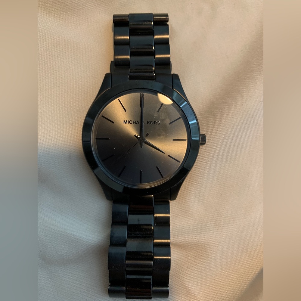 Women’s black Michael Kors watch